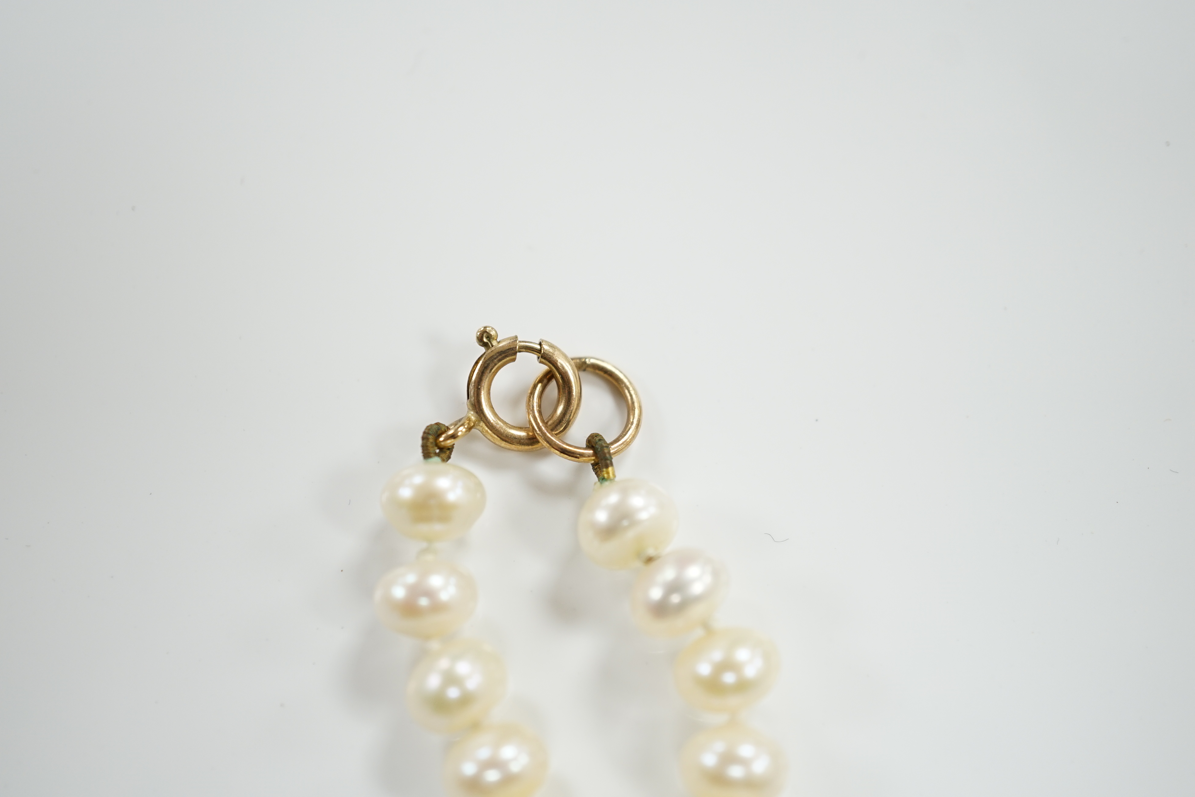 A single strand cultured pearl necklace, with 9ct clasp, 46cm.